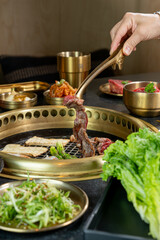 A beautiful spread of Korean Barbecue meats, seafood, veggies and accoutrements.