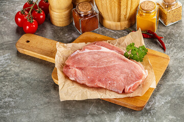 Raw pork schnitzel for cooking