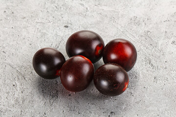 Raw ripe black kumato tomato