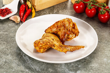 Tasty roasted chicken wing with spices