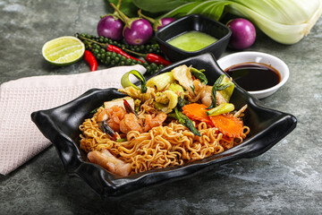 Asian cuisine - Fried noodles with seafood
