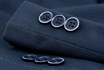 Sleeve of a men's jacket with buttons. Jacket element. Sleeve