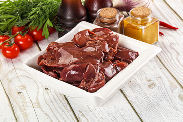 Raw chicken liver uncooked in the bowl