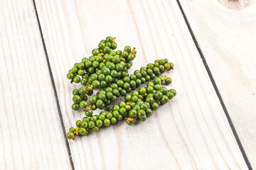 Green pepper corn on the branch