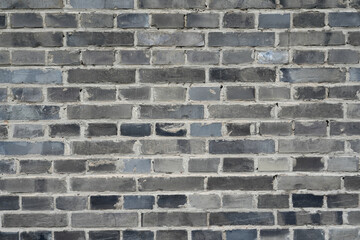 facade view of old grunge brick wall background