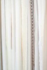 Background from samples of fabrics for curtains and tulles.