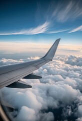 Obraz premium Cloudy Sky View From Airplane Wing During Sunset Over the Ocean