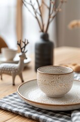 Elegant Table Setting With Textured Plates and Seasonal Decor