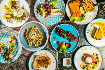 grilled Beef belly steak, Orecchiette Pasta with Spinach, Mushrooms, Porcini wontons with buffalo mozzarella, Fried cod fish and chips, Roasted Spring Chicken, French Apple Batch, New York Cheesecake