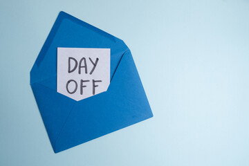 Day off - workplace message in the office. Concept of absence from work and day off
