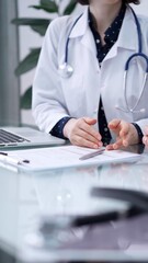 Doctor and patient are sitting and talking at the glass table, Medicine and health care concept