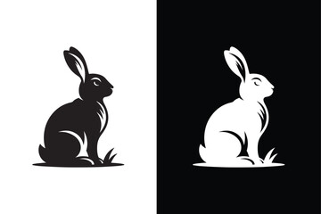 Black silhouette of a rabbit isolated on white and black background.