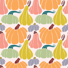 Seamless pumpkin pattern. Background of autumn pumpkins. Autumn texture for Thanksgiving, harvest and Halloween.