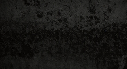 Black background made of real, shiny black paper covered with foil, illuminated by a soft light from above.	