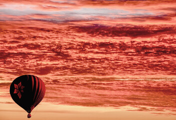 Practice at sunset of the sport of ballooning in the skies of Brasilia, with multicolored balloons. Brazil, 2020