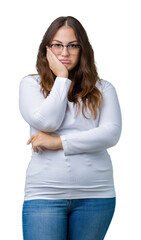 Obraz premium Beautiful plus size young woman over isolated background thinking looking tired and bored with depression problems with crossed arms.