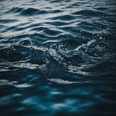 Obraz premium The setting sun creates golden ripples on a quiet pond, its calm surface reflecting the colors of the sky