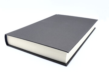 One empty book. Black cover and white background. 