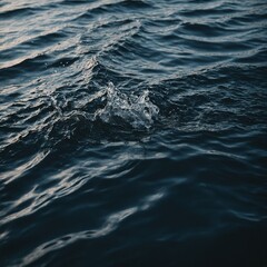 Obraz premium The sunset casts brilliant colors across the ocean, creating a path of golden light on the gentle waves