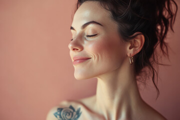 A close up of a woman's face with tattoos and her eyes closed