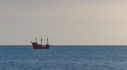 pirate ship at sunset