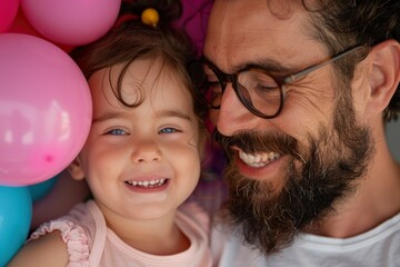 A Dad Playing With His Daughter, Sharing A Joyful And Fun Birthday Moment