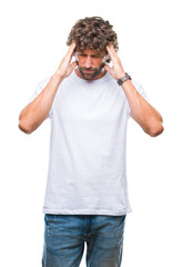 Handsome hispanic model man over isolated background with hand on head for pain in head because stress. Suffering migraine.