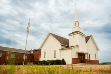 a traditional church with a steeple