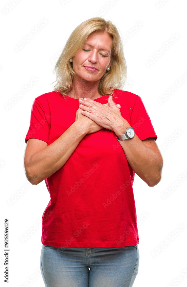 Sticker Middle age blonde woman over isolated background smiling with hands on chest with closed eyes and grateful gesture on face. Health concept.