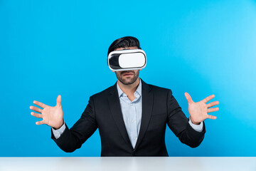 Smart businessman sitting while pointing and choosing data analysis by using technology innovation. Professional caucasian project manager using virtual reality glasses and VR goggles. Deviation.