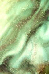 abstract art background of streaks in green tones