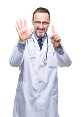 Middle age senior hoary doctor man wearing medical uniform isolated background showing and pointing up with fingers number six while smiling confident and happy.