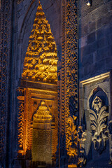 Erzurum Cifte Minareli Medrese or Intricate carvings and illuminated details mTwin Minaret Madrasa,...