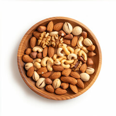 Top view, wooden plate containing a lot of pistachios, walnuts, pecan nuts, bright light, white background 