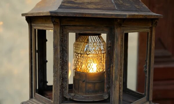Warmth from a crackling fire illuminates a cozy living room, casting dancing flames against the marble hearth