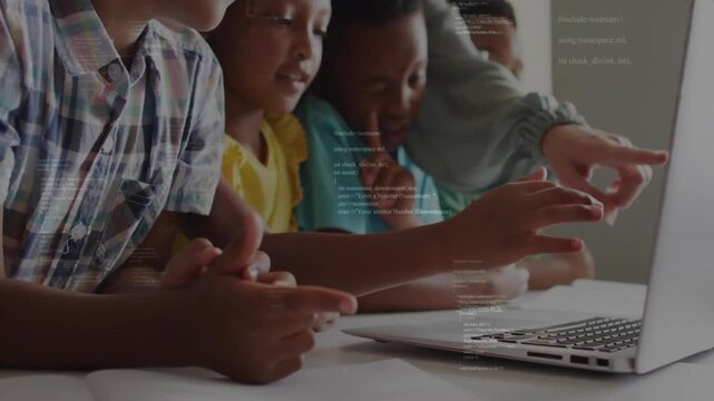 In school, children learning coding by programming animation on laptop