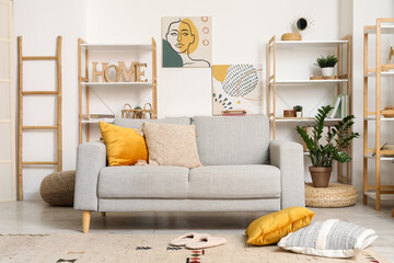 Fototapeta premium Interior of living room with sofa and slippers on carpet