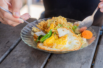 Delicious Fried Egg and Noodles Dish