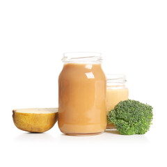 Glass jars of healthy baby food, pear and broccoli isolated on white background