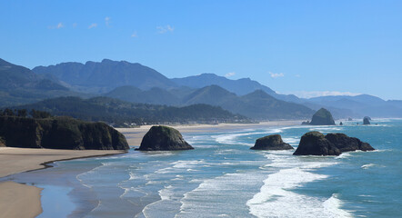 View from Ecola State Park onto Cresent Beach and in the distance Haystack rock and Cannon Beach.