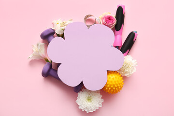 Beautiful composition with blank card, sports equipment and flowers on pink background