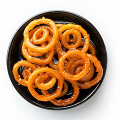 Fototapeta premium a bowl of onion rings on a white surface