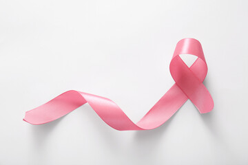 Pink ribbon on grey background. Breast cancer awareness concept