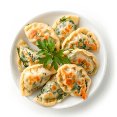 a plate of dumplings with spinach and cheese