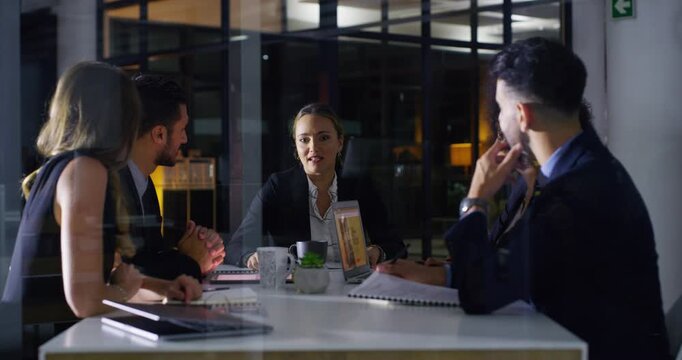 Business people, night meeting and documents for teamwork, collaboration and revenue proposal in office window. Professional manager, group planning and giving portfolio for finance or taxes review