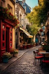 Obraz premium A charming cobblestone street featuring red chairs and tables.