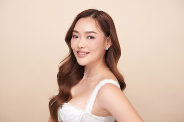 Beautiful young asian woman with clean fresh skin on beige background, Face care, Facial treatment, Cosmetology, beauty and spa, Asian women portrait.