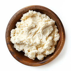 a wooden bowl filled with mashed potatoes