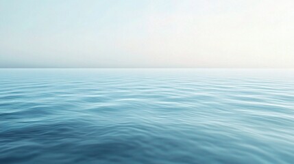 Obraz premium Serene Ocean Horizon: Calm, tranquil waters meet a hazy sky, creating a peaceful and meditative seascape. Perfect for travel, nature, or relaxation themes. 