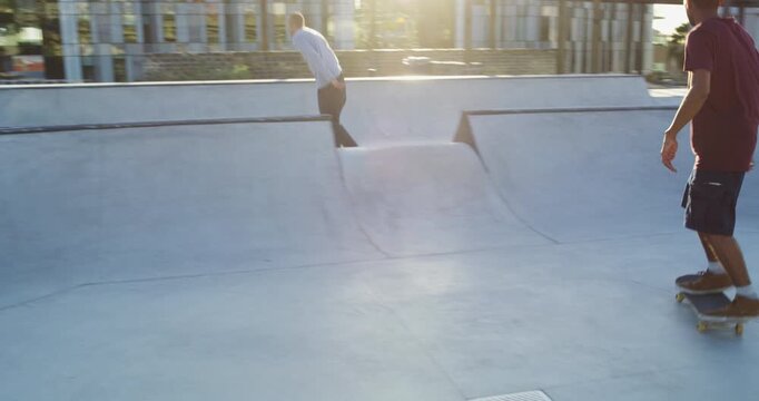 Men, group and skateboard trick at park for sports exercise or summer fitness, balance or bowl ramp practice. Male people, riding freestyle or speed challenge fr street fun, workout or skill contest